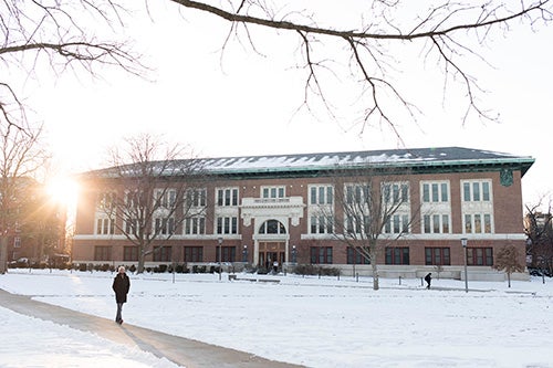 The sun sets on Lincon Hall during a winter day in 2019.