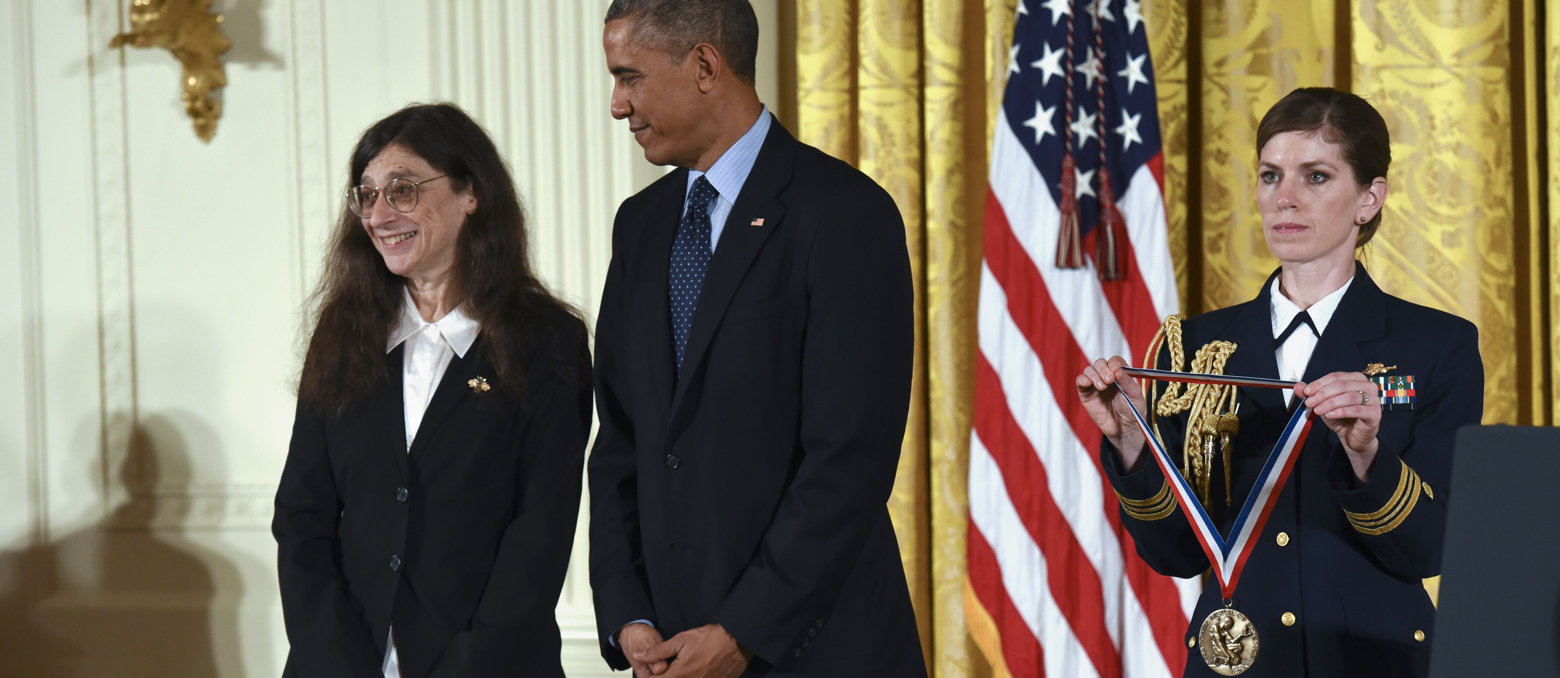 May Berenbaum receives a National Medal of Science award from President Obama at a White House ceremony.