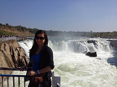 Lindsey stands near popular waterfalls at Jabalpur, India.