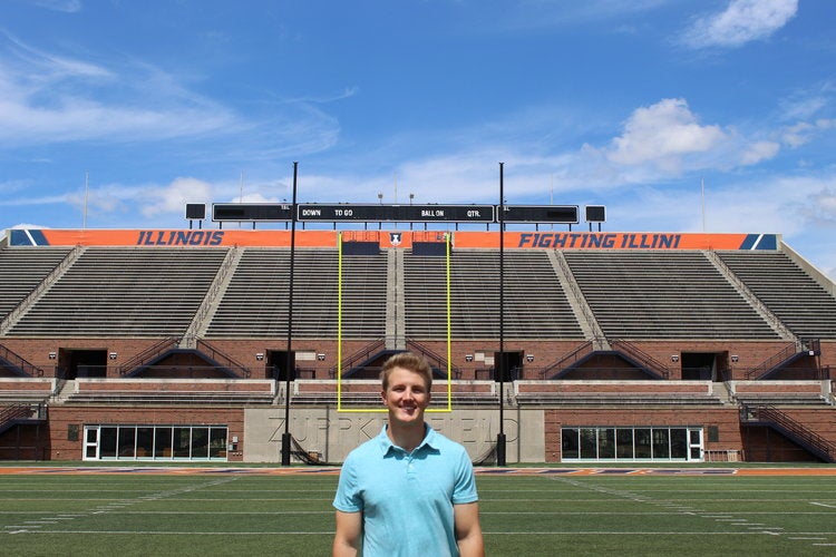 Senior LAS student Alex Bryk poses for a photo at Memorial Stadium.