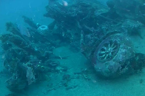 The “Heaven Can Wait” forward fuselage resting in Hansa Bay.