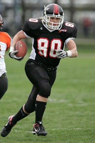 Ashley Berggren playing football 