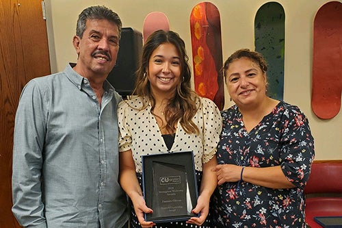 Jazmin Olivas with her parents