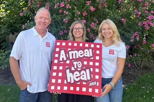 Alumnus John Kelly is pictured with his family.