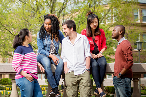 Students speaking on campus