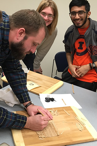 Dan Leon and students make paper