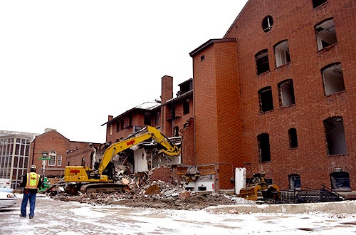 Excavator demolishing Illini Hall