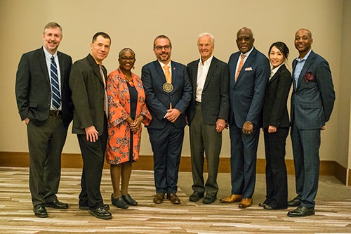 Jerry Davila, George Deltas, Venetria Patton, Marcelo Medeiros, Jorge Paulo Lemann, Chancellor Robert Jones, Eun Yi Chunk, and Kevin Jackson 