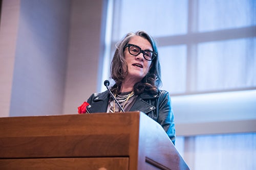 Leslie J. Reagan speaks at an investiture ceremony