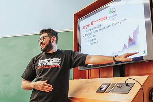 A student points to a screen