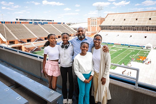 Kameno Bell and his family at Memorial Stadium