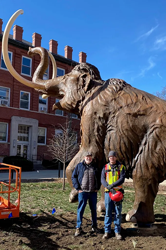 Mammoth with people in front for perspective