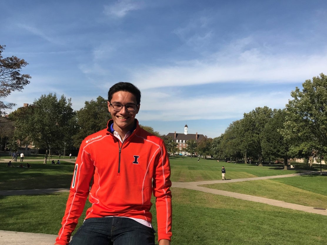 LAS student poses for photo on the south side of the Quad