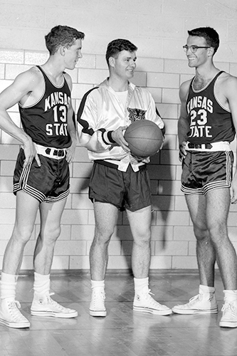 Stephen Douglas (right) with coach Tex Winter and another player