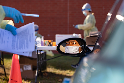 Rearview mirror of car at COVID-19 clinic