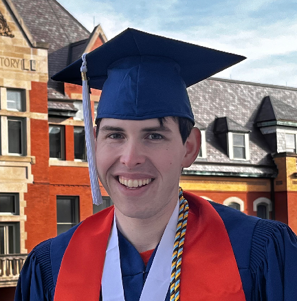 GGIS alum Jason Segal in his blue cap and gown for graduation