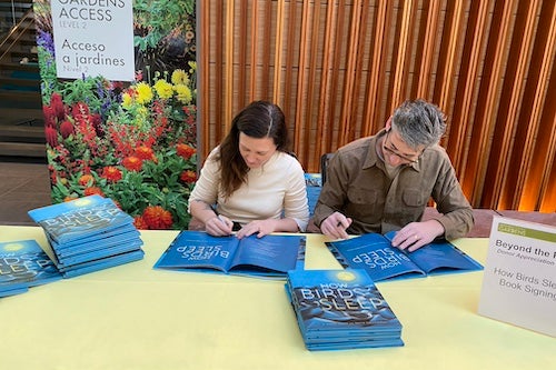 Author and illustrator at a book signing event