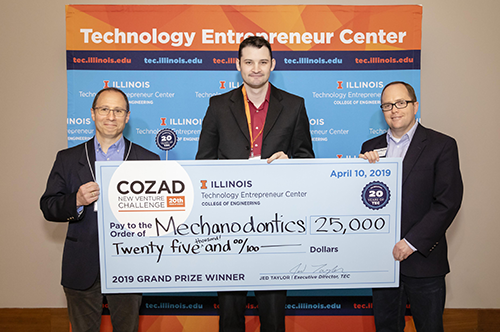 Mechanodontics receives award check from TEC