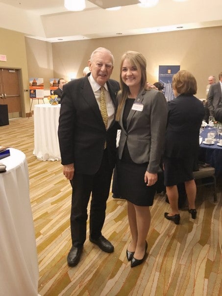 LAS junior Victoria Wilson takes a photo with LAS alumnus and world-renowned paleontologist Donald Johanson.