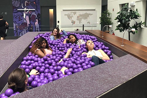 Students pose in a ball pit in Brazil