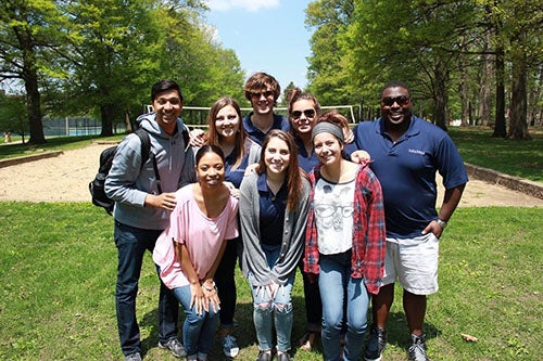 LAS Leaders pose in a park