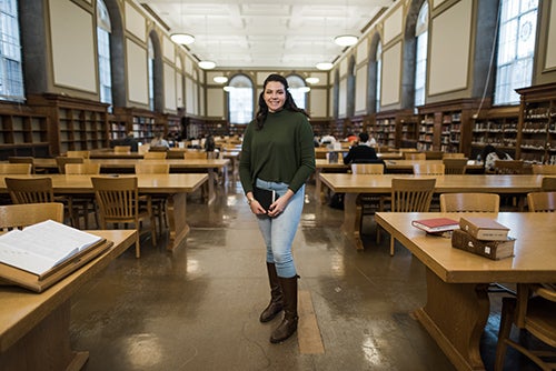 Edith Munoz poses in the Main Library at the University of Illinois