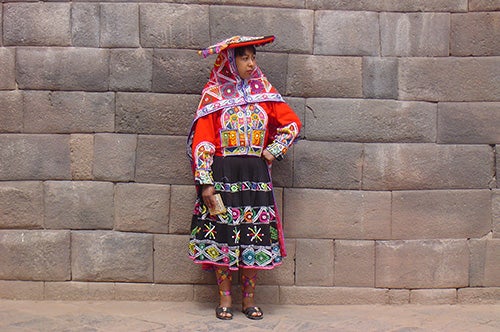 A woman dressed in traditional clothing in Peru