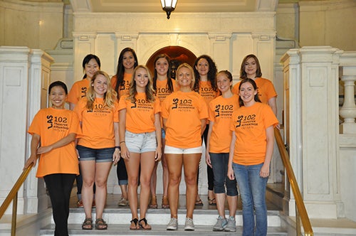 LAS 102 interns pose together in the lobby of Lincoln Hall