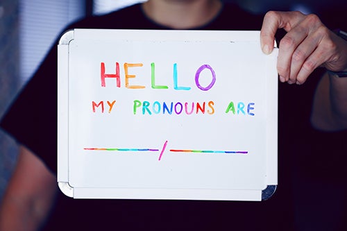 A whiteboard with text "My pronouns are" and a blank space to fill in the pronouns