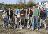 Students in Vienna planted 600 of 10,000 trees and shrubs planted in October as part of a reforestation program. Efforts like these are one way in which the students who participate in the study abroad program are trying to reduce their carbon footprint. (Photo courtesy of Bruce Murray.)