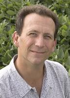 Plant biology professor Evan DeLucia researched how converting land to biofuel crops affects soil carbon. (Photo by Don Hamerman.)