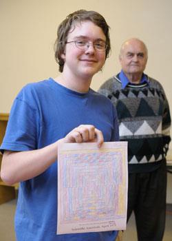 Urbana High School sophomore Fabian Junge was one of several students who successfully solved the map-coloring puzzle given to them by Professor Wolfgang Haken, who admitted that he had never colored a map until a week earlier and it took him an hour when he tried the same puzzle he gave the students.