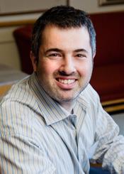 Economist Darren Lubotsky says immigrants close the earning gap with American-born workers about half as fast as previously thought. (Photo by L. Brian Stauffer)