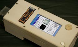 This handheld reader, developed at U of I, analyzes the color changes in the sensor array to quickly monitor an environment for explosive chemicals. (Photo courtesy of Ken Suslick)