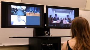 A small group of U of I students joined college students from Mexico in posing questions to a worldwide panel of UN staff, Rwandan officials, a genocide survivor, and others in a videoconference arranged by the United Nations. (Photo by Thompson-McClellan)