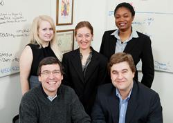 The Scientific Animations Without Borders team at U of I includes extension educator Francisco Seufferheld (seated, left), entomology professor Barry Pittendrigh (right), and, standing: graduate student Laura Steele (left), project leader and field extension specialist Julia Bello-Bravo (center) and graduate student Tolulope Agunbiade. (Photo by L. Brian Stauffer)