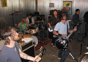 Inspired by recording their last album in a garage, the Foo Fighters frontman Grohl came up with the idea of performing private concerts in the garages of fans.