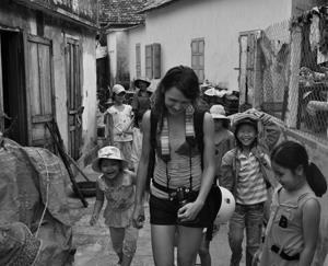 Emma Swift, visiting Vietnam on a Fulbright Grant, has found plenty of interesting things to photograph in southeast Asia. She's an object of interest herself.