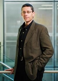 U of I professor of entomology Gene Robinson discovered that certain bees exhibit a willingness or eagerness to 'go the extra mile,' which can be vital to the life of the hive. (Photo by L. Brian Stauffer)