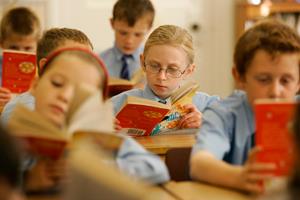 A new study indicates that exposure to broad generalizations about the likely success of a social group--boys or girls, for example--undermines both boys' and girls' performance on a challenging task. (Public domain photo by Jallinson01)