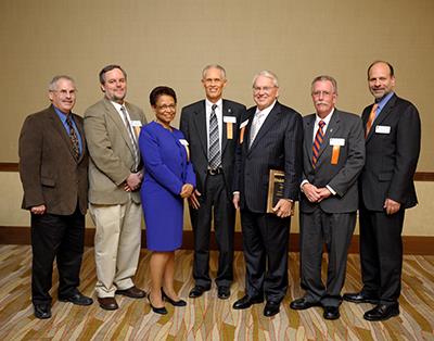 The 2013 LAS Alumni Award winners attended a college reception in their honor. Pictured are Kenneth Slaw, Stephen Elledge, Edna Medford, Joel Coats, Paul Boltz, and Keith Westcott with LAS Interim Dean Brian Ross. (Westcott received the University of Illinois Alumni Association Loyalty Award.)