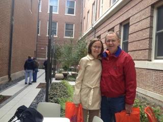 Carrie Klaus and her father, both Illinois alumni, toured the Lincoln Hall courtyard where five of their family members are honored through memorials.