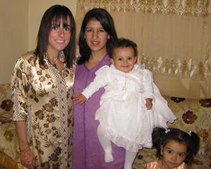Cara Herman (BA '08, international studies), at left, celebrated the Muslim holiday Eid al-Fitr with her host family 'sisters' in Morocco.