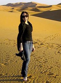 Herman spent 27 months in Morocco during her Peace Corps service. Here she is at the Merzouga Desert.
