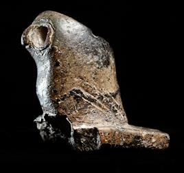 The Hopewell people used distinctive stone pipes, often with effigies on them, like this owl pipe found in an early village excavation in Illinois. (Photo by L. Brian Stauffer)