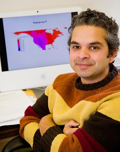 Anthropology professor Ripan Malhi's lab uses DNA from both ancient and living people as a window into the past to track population movements and infer when a particular group diverged from another group. (Photo by Don Hamerman.)