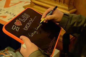 Students answered 'I love LAS because....' Their photos and answers were shared on LAS's Twitter page. (Photo by LAS student photographer Jongbum Kwon.)