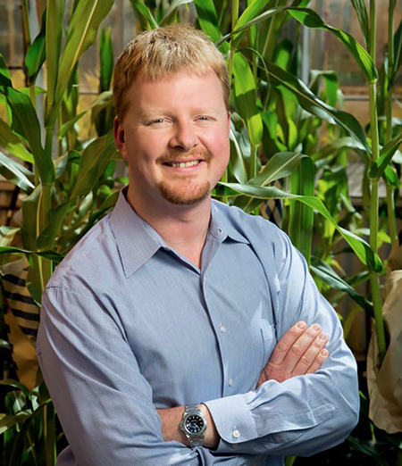 Andrew Leakey, associate professor of plant biology, will lead a multi-institutional team to increase the water use efficiency of sorghum. (Photo by L. Brian Stauffer)