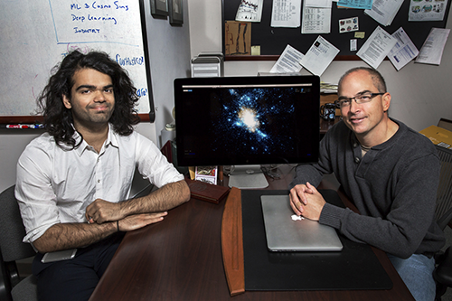 A new, faster modeling technique for galaxy formation has been developed by University of Illinois student Harshil Kamdar and professor Robert Brunner. The technique uses machine learning to cut down computing times from thousands of computing hours to mere minutes. (Photo by Joyce Seay-Knoblauch)