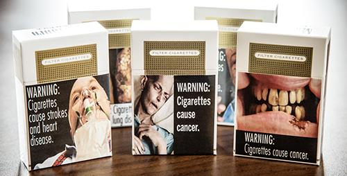 Graphic warning labels on cigarette packages, like these approved for use in the U.S., may not have the desired effect, according to a University of Illinois study. (Photo by L. Brian Stauffer.)
